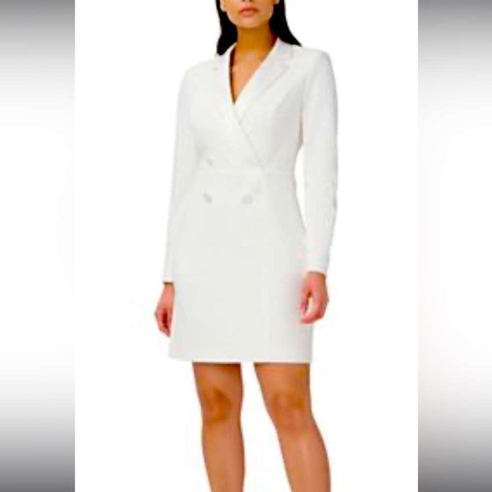 COPY - Elegant white off-shoulder dress with decorative front detail.